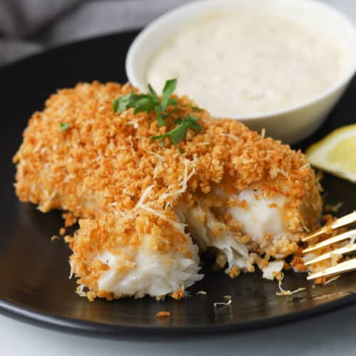 Close up of flaked breaded cod fillet