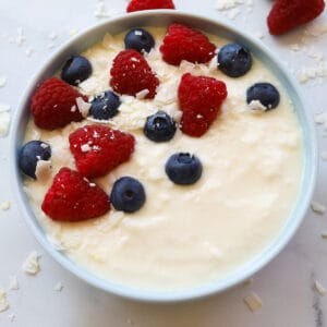 Yogurt with berries in a bowl.