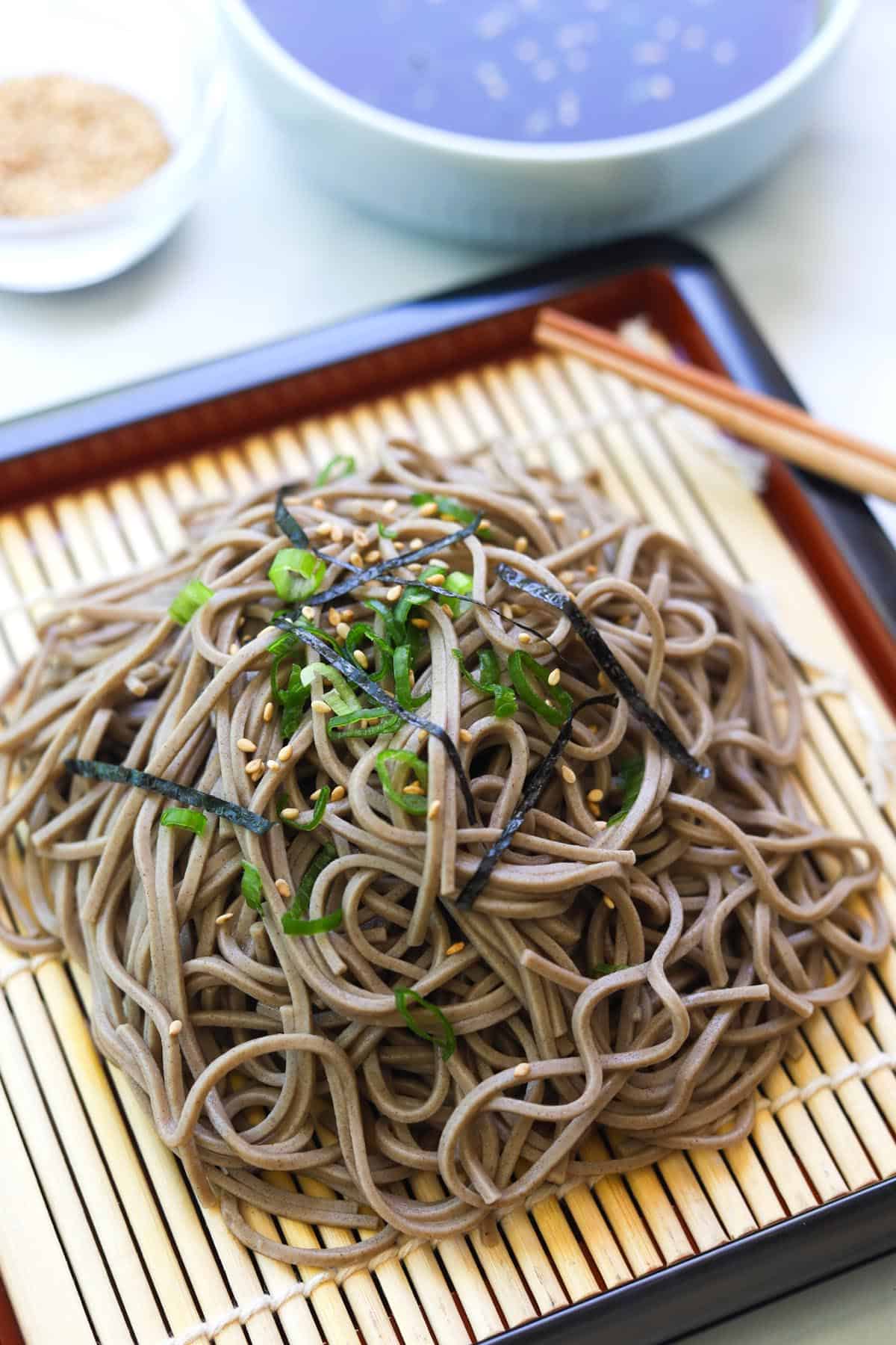 Noodles on bamboo mat.