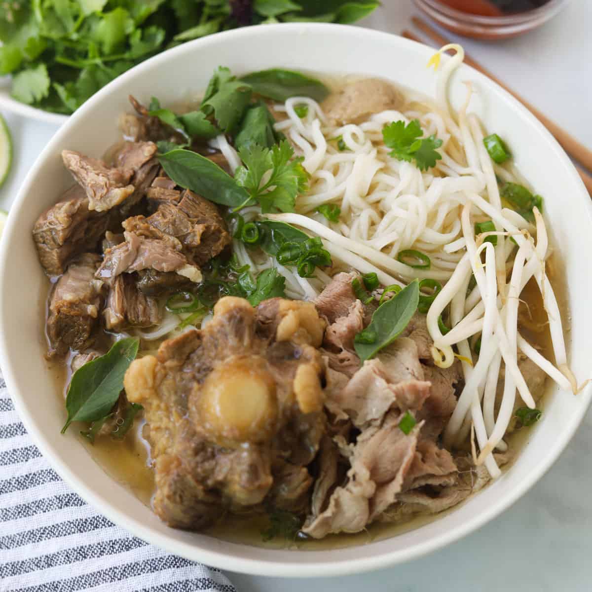 Bowl of pho with meat. 