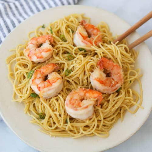 Noodles with shrimp on a plate.