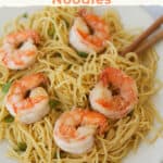 Noodles with shrimp on plate.
