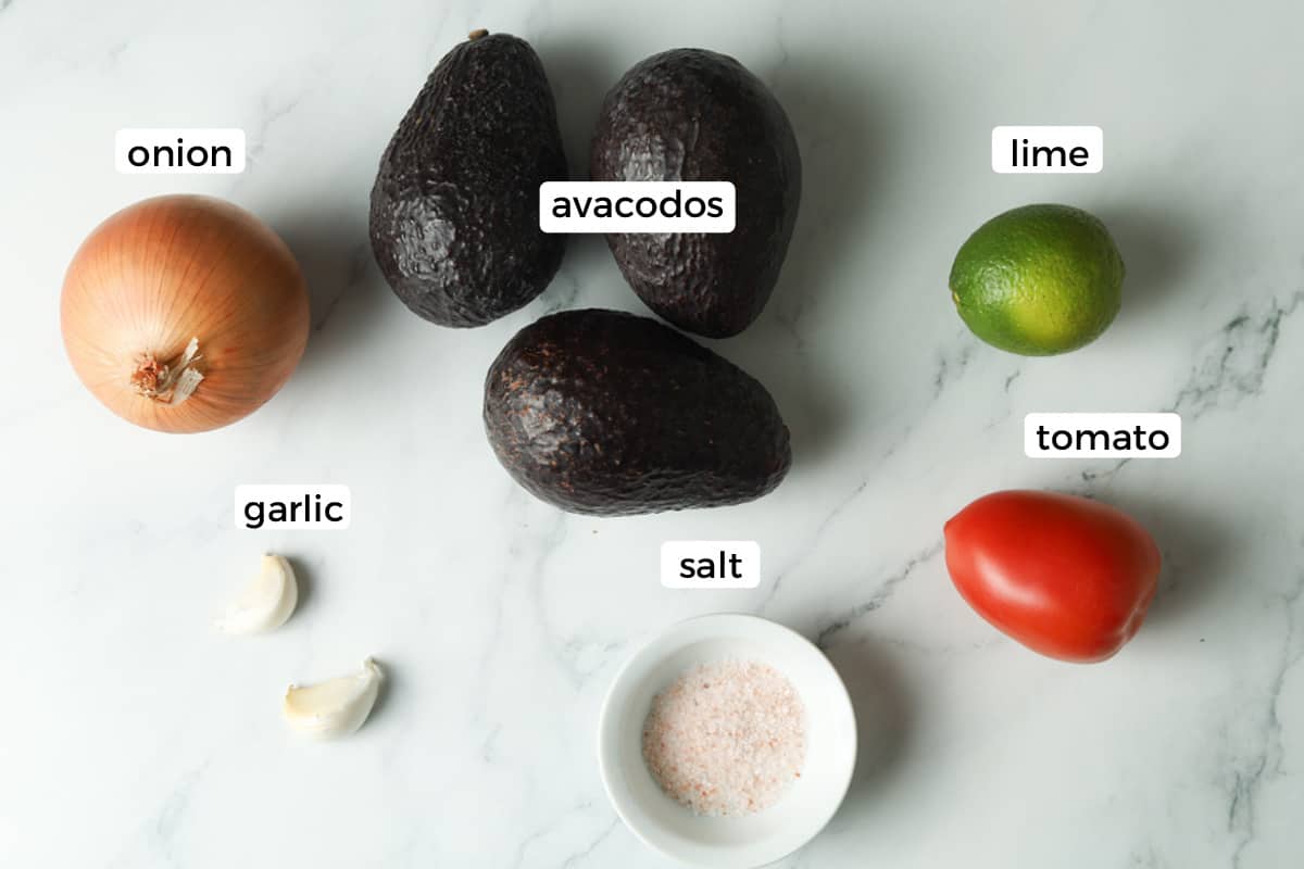 Ingredients: avocados, onion, lime, tomato, garlic and salt.