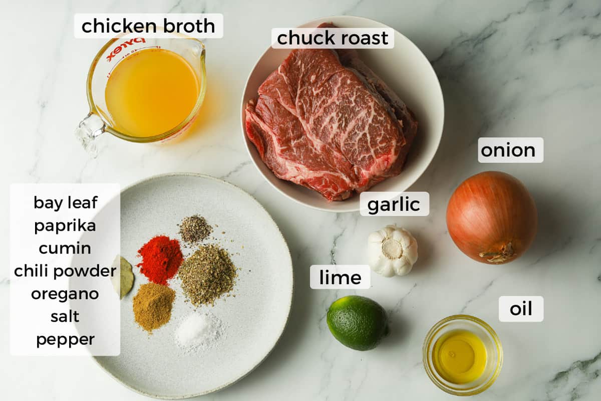 Ingredients: chicken broth, chuck roast, onion, garlic, lime, oil, dry seasoning.
