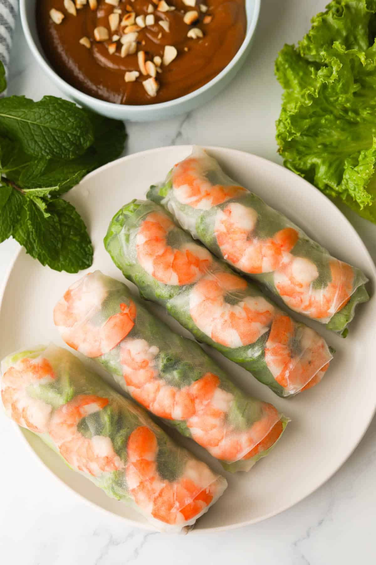 shrimp spring rolls with side of peanut sauce