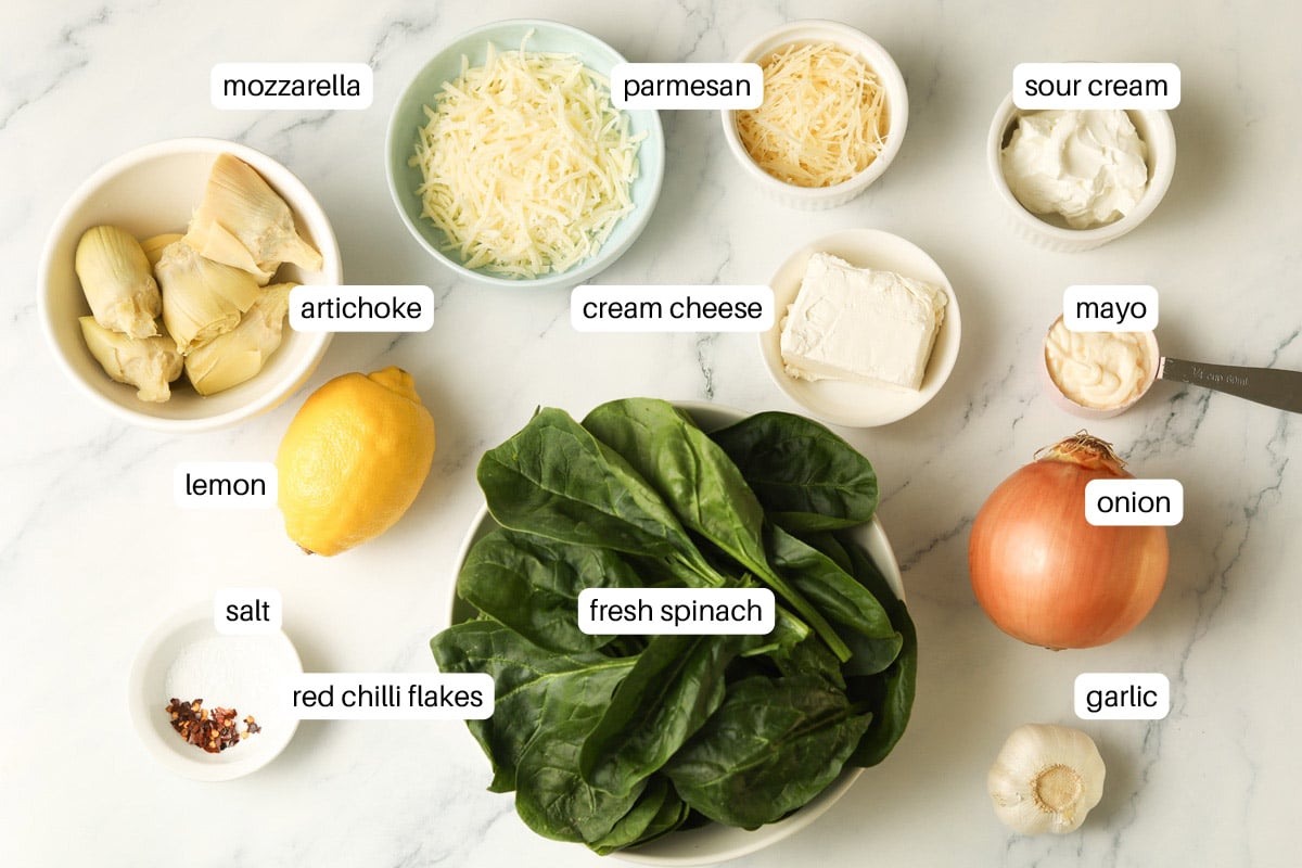 Ingredients for spinach artichoke dip.