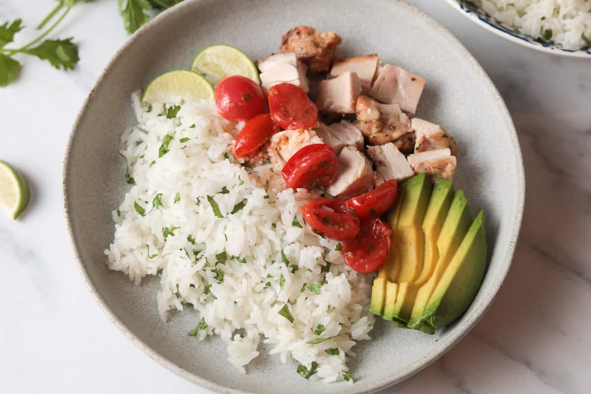 Cilantro rice with avocados, tomatoes, chicken.