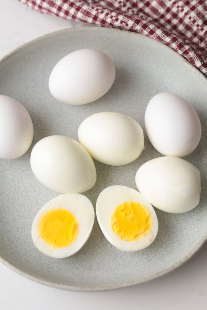 Hardboiled eggs on a plate.