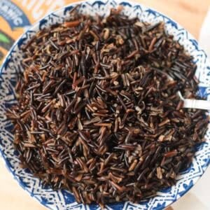 Cooked wild rice in bowl.