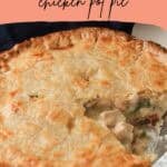Whole chicken pot pie with slice cut out.