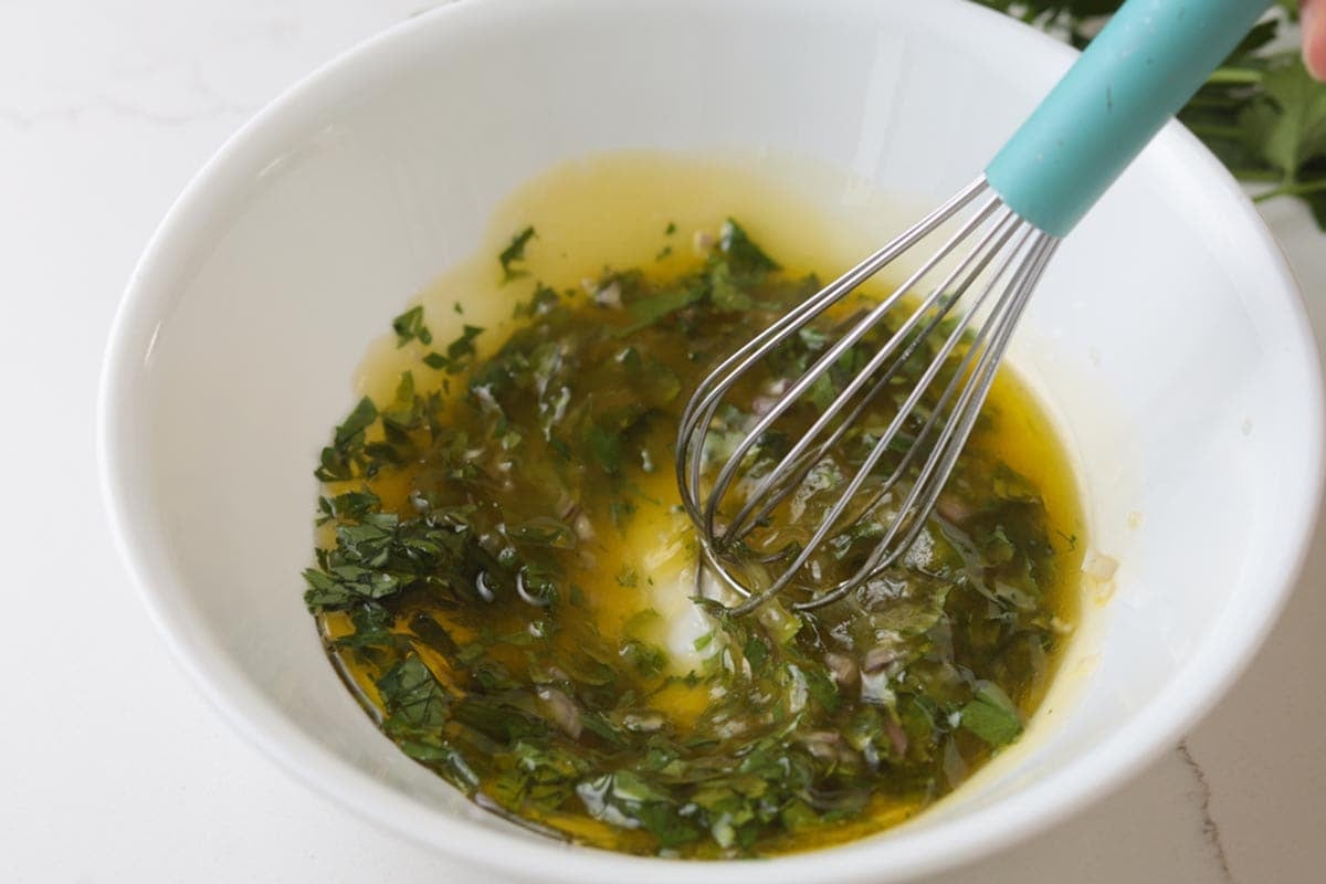 chopped herbs with olive oil
