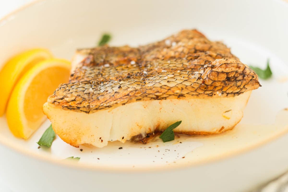 Grilled Chilean sea bass filet skin on