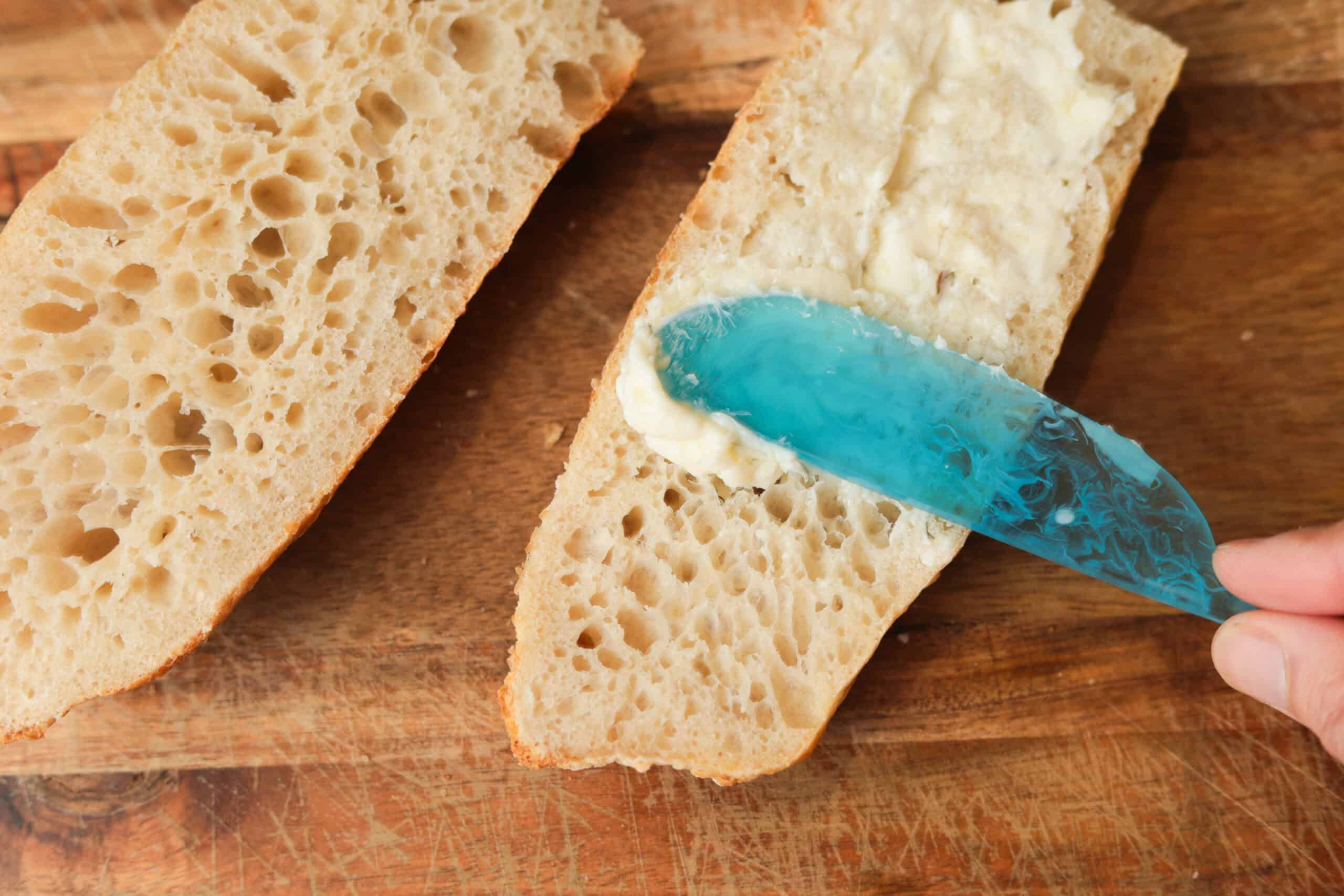spreading butter on bread