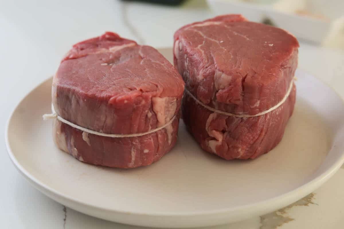 Two filet mignon tied.