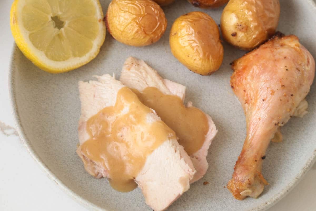 Roasted chicken with gravy.