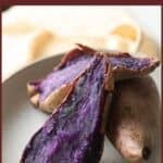 Roasted Japanese purple potato cut in half.