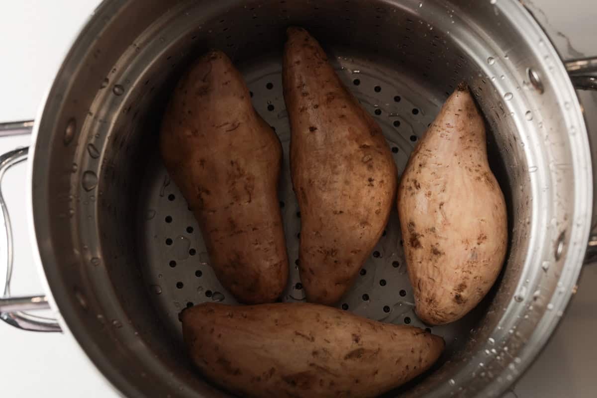 Japanese yams in steamer basket.