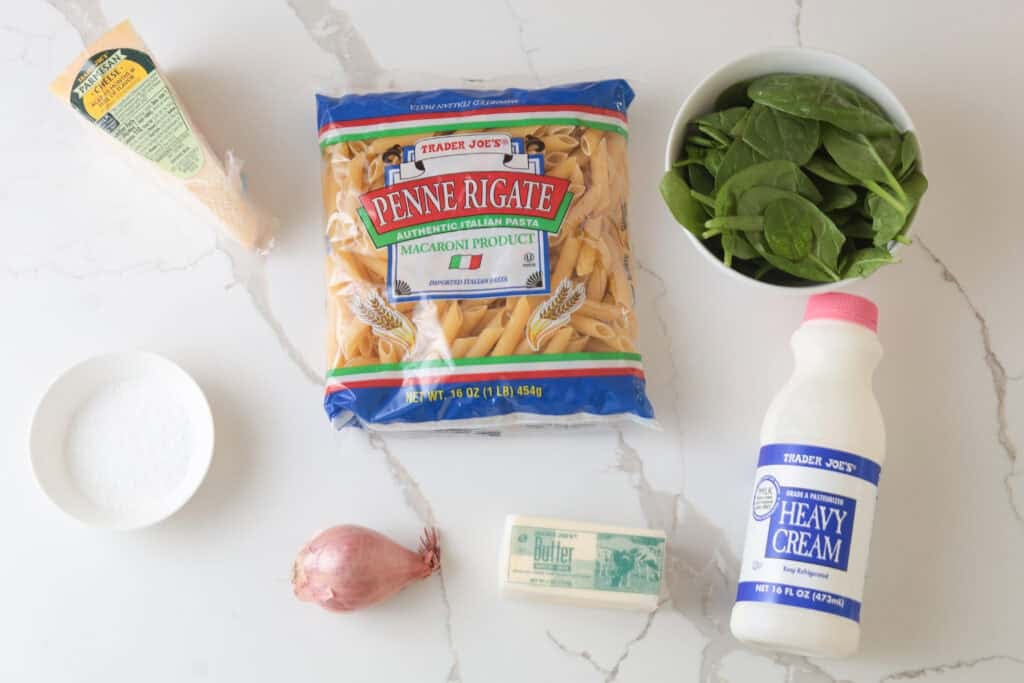 Penne pasta, shallot, butter, heavy cream, salt, parmesan cheese, spinach.