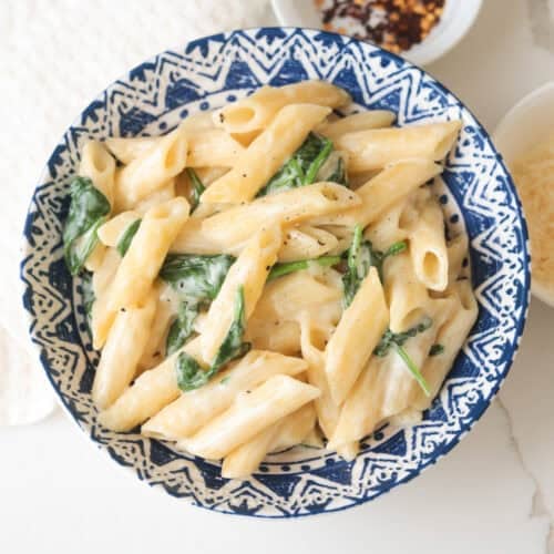 Cream penne pasta with spinach