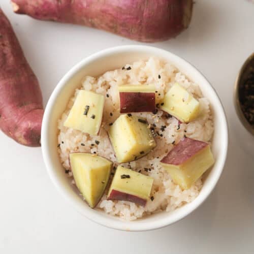 Rice and cut sweet potatoes in bowl.