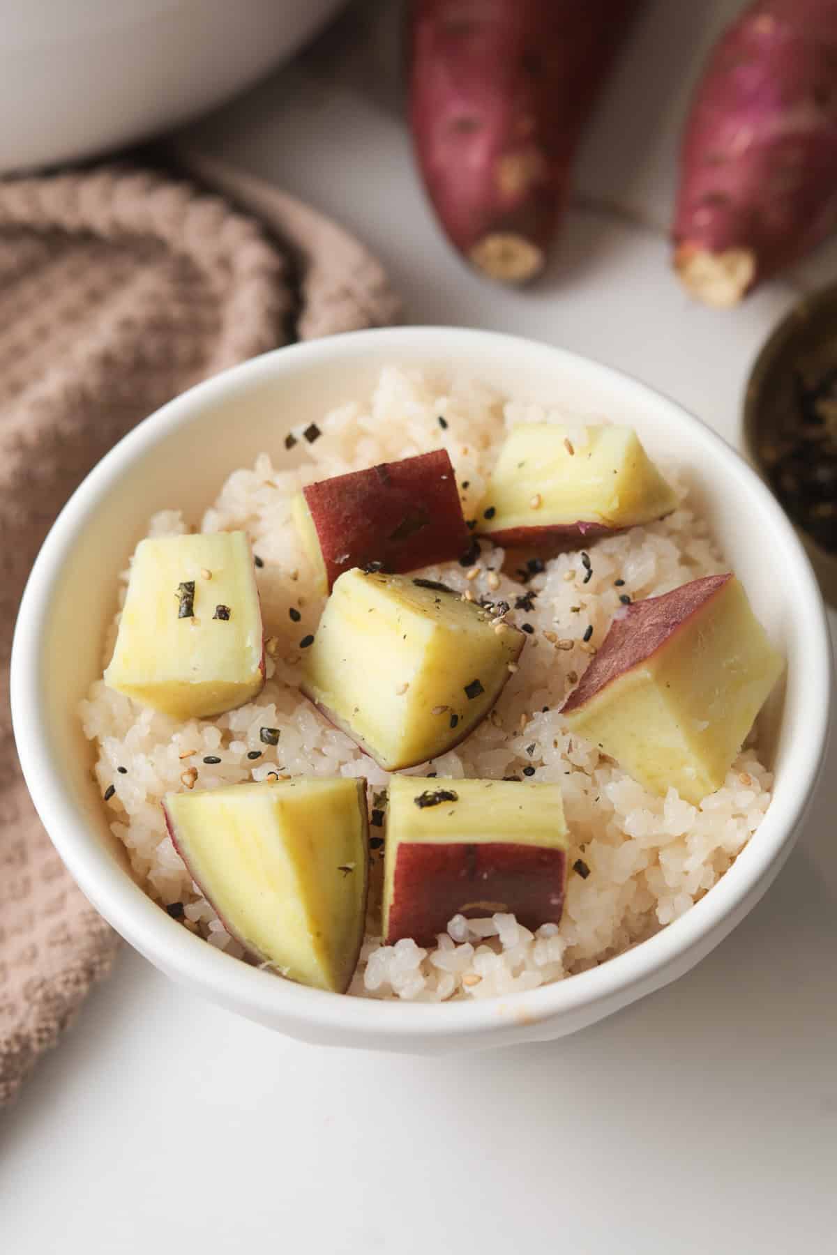 Rice with Japanese sweet potato in bowl