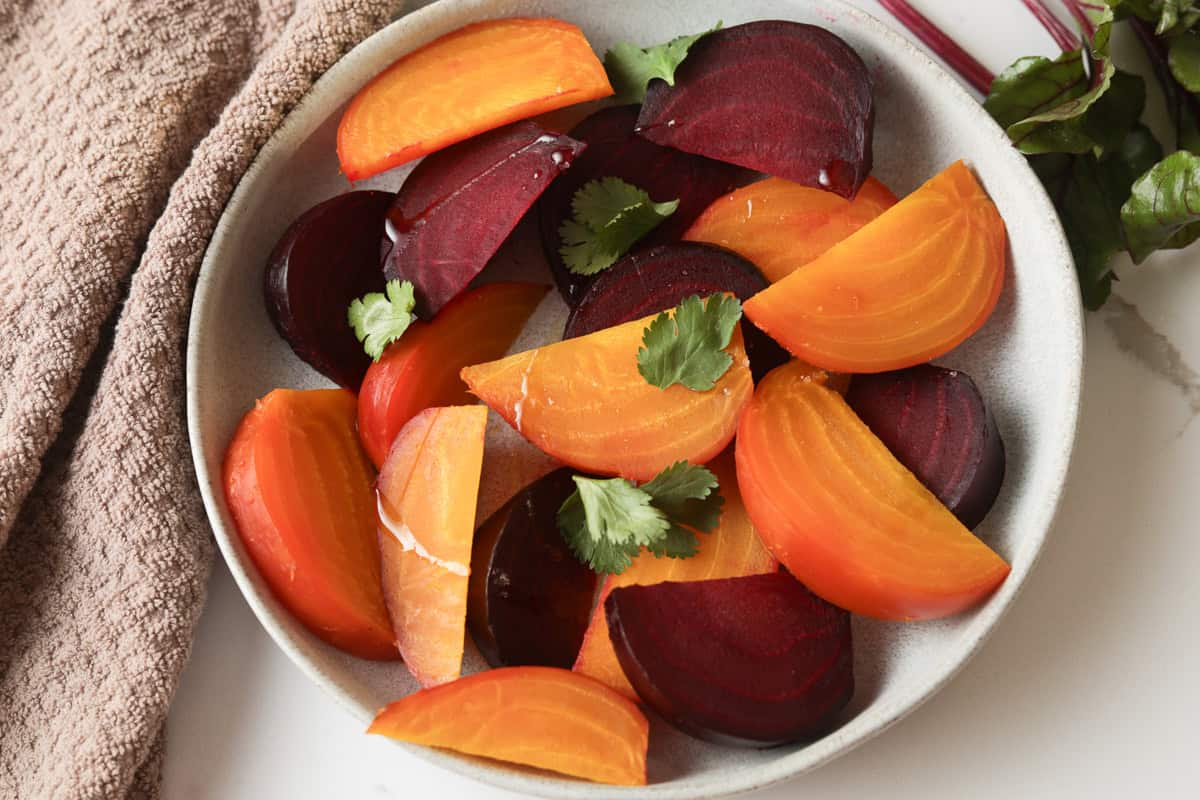 Cut up beets in a bowl.