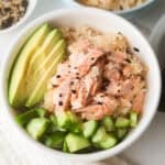 Rice bowl with salmon, cucumbers and avocado
