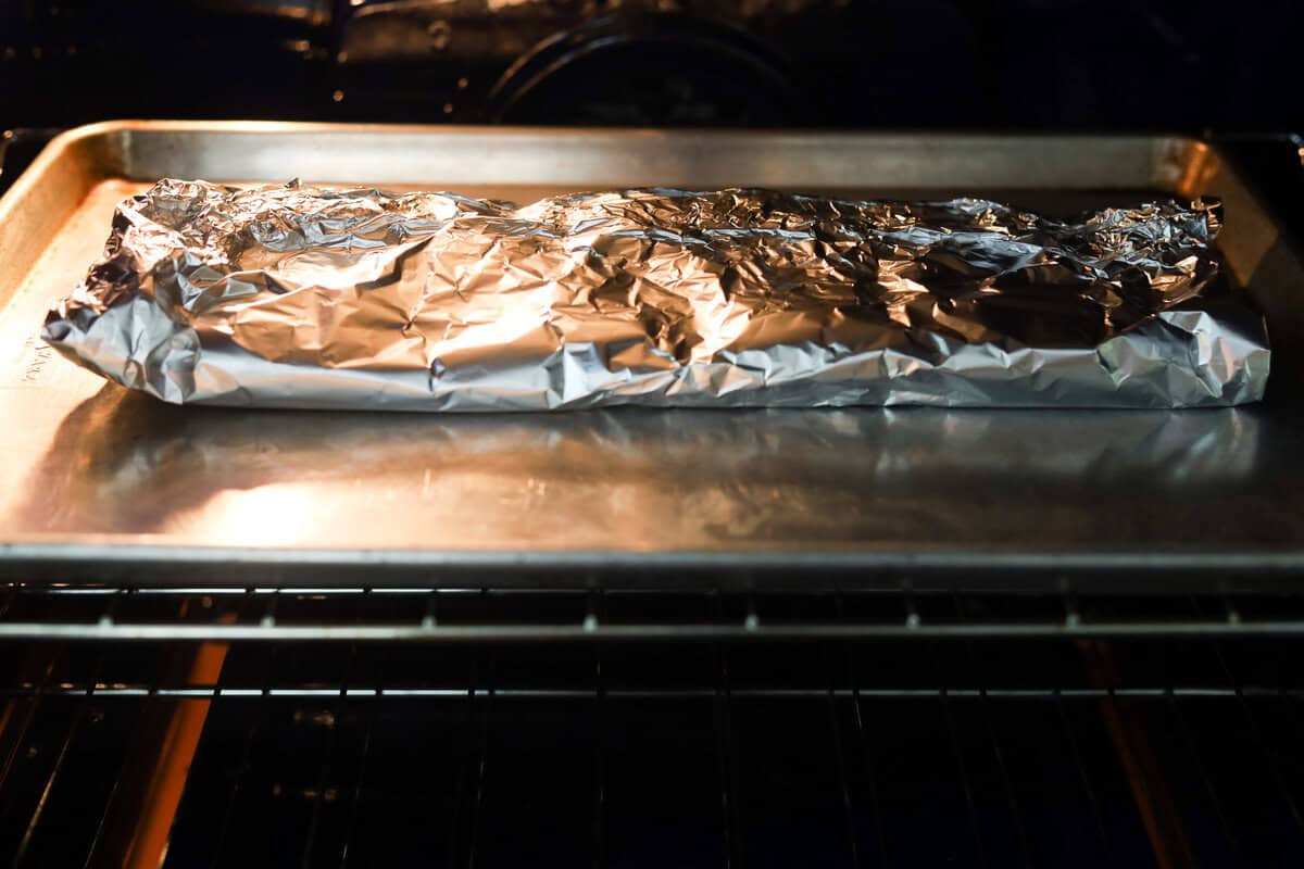 St louis ribs wrapped in foil in oven.