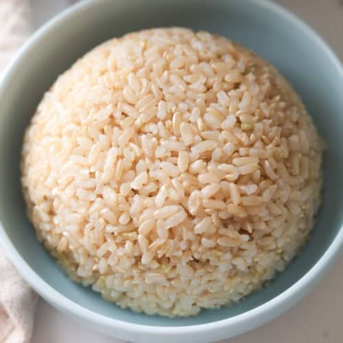 Cooked brown rice in a bowl.