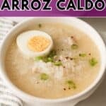 A Pinterest graphic featuring a bowl of arroz caldo porridge topped with a hard-boiled egg half, with a purple top banner that reads "How to Cook RICE COOKER ARROZ CALDO".