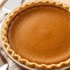 Close up square shot of freshly baked pumpkin pie.